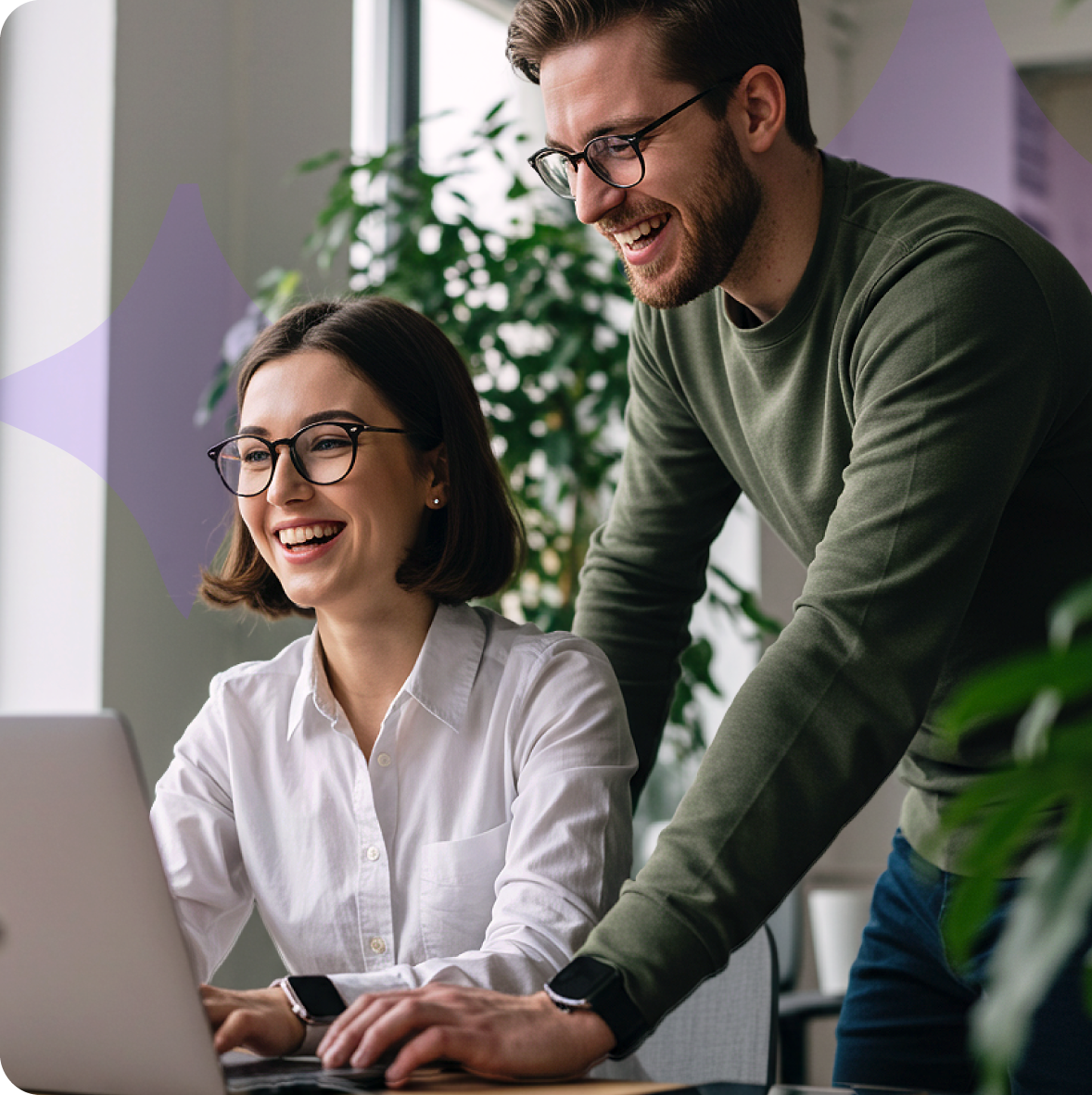 stock photo of two people on a computer